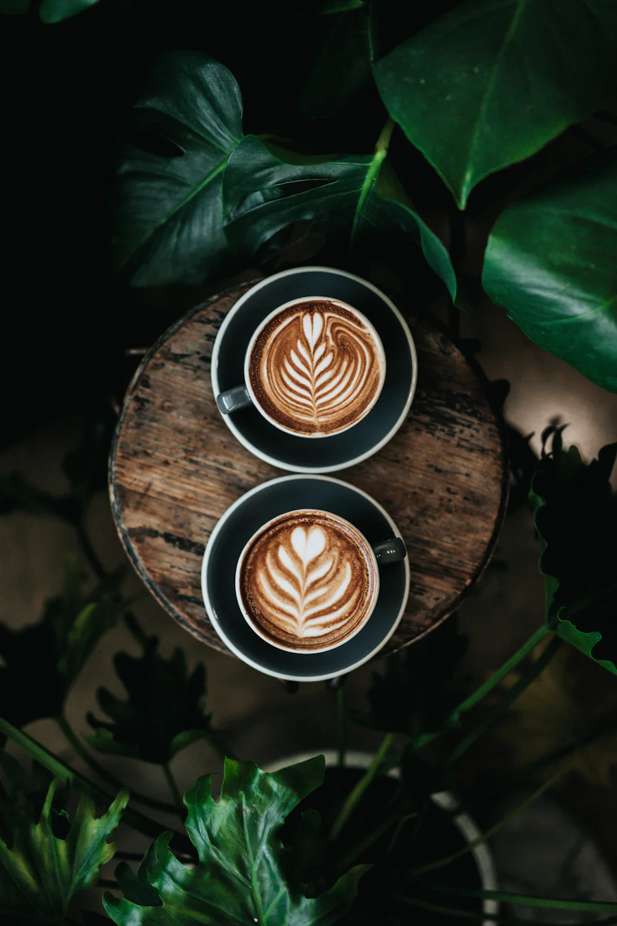 Two mugs of coffee on a table