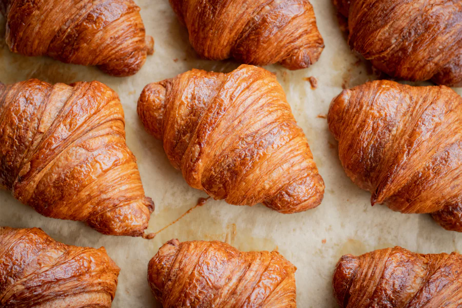 A tray of freshly baked croissants