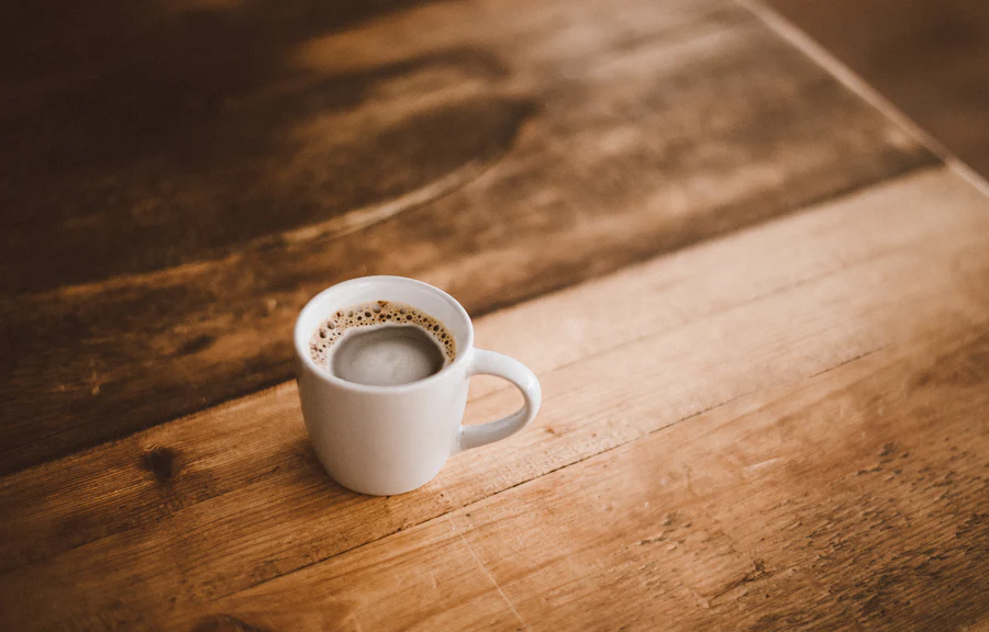 A cup of coffee on a wooden table
