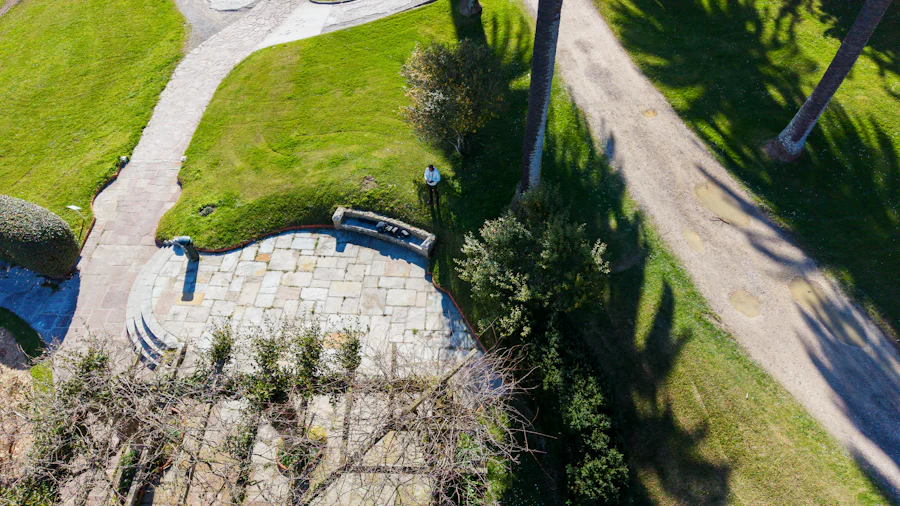 A newly laid natural stone path winding through a planted garden